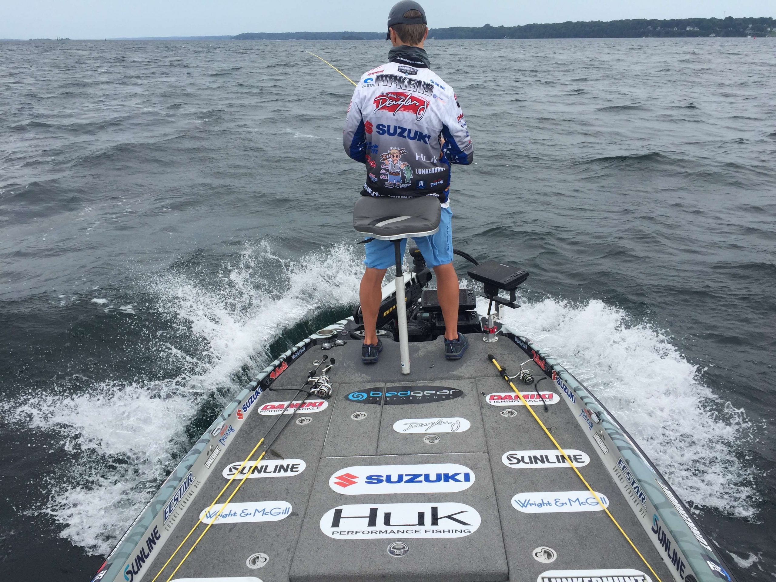 Day 1 conditions toughen as afternoon wind picks up on the river.