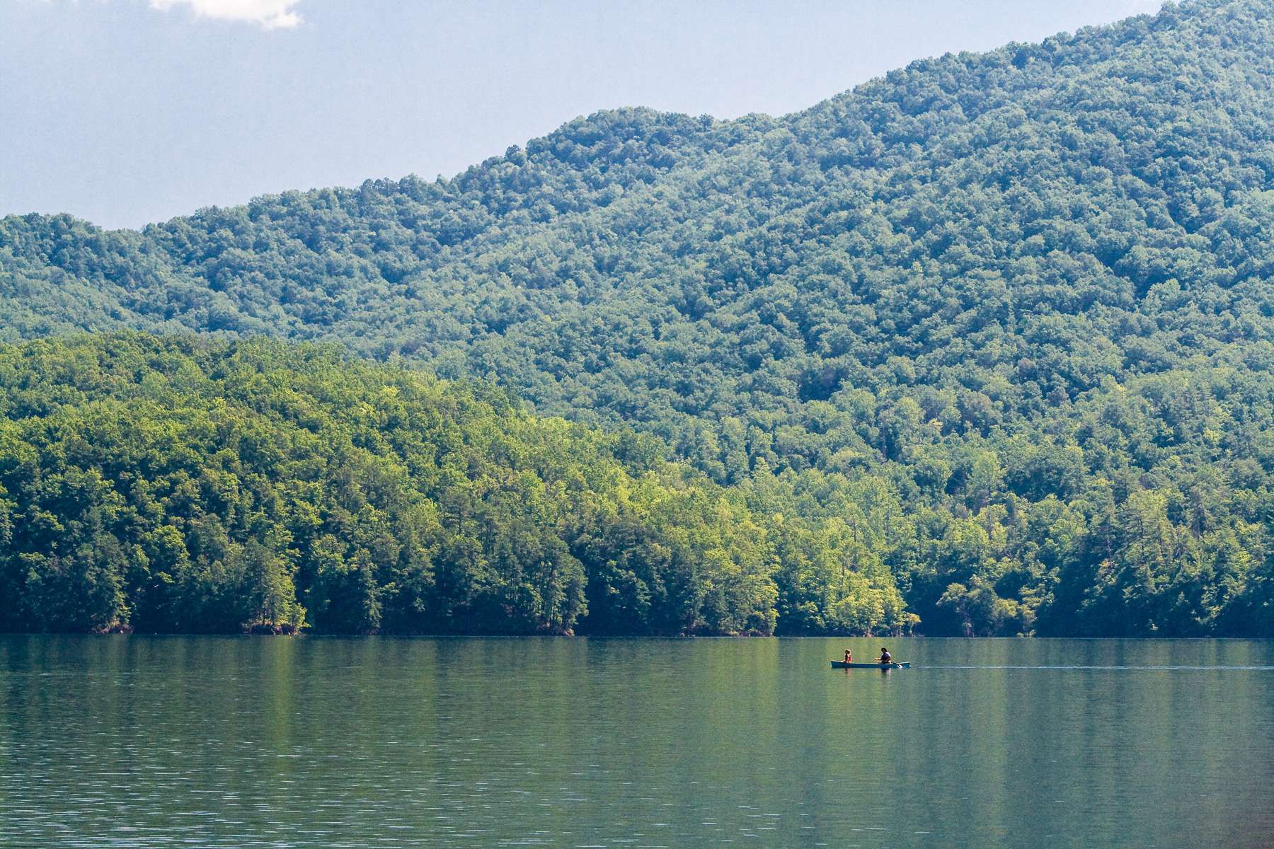 <h4>16. Fontana Lake, North Carolina </h4> [10,230 acres] This lake is a rare find, as you can catch the three main species of bass here (smallmouth, largemouth and spots). Although you are not likely to catch giant fish here, the scenery more than makes up for it. Fontana is not easy to get to, and therefore does not receive a ton of fishing pressure. Remember, dumb fish are fun fish. Plus, the regional fisheries supervisor for North Carolina ranks it as the best lake in the state.