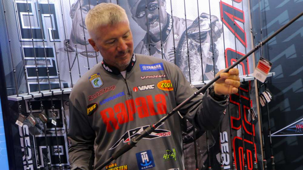 Randall Tharp holds an Ark Rod, a new rod company to ICAST this year.