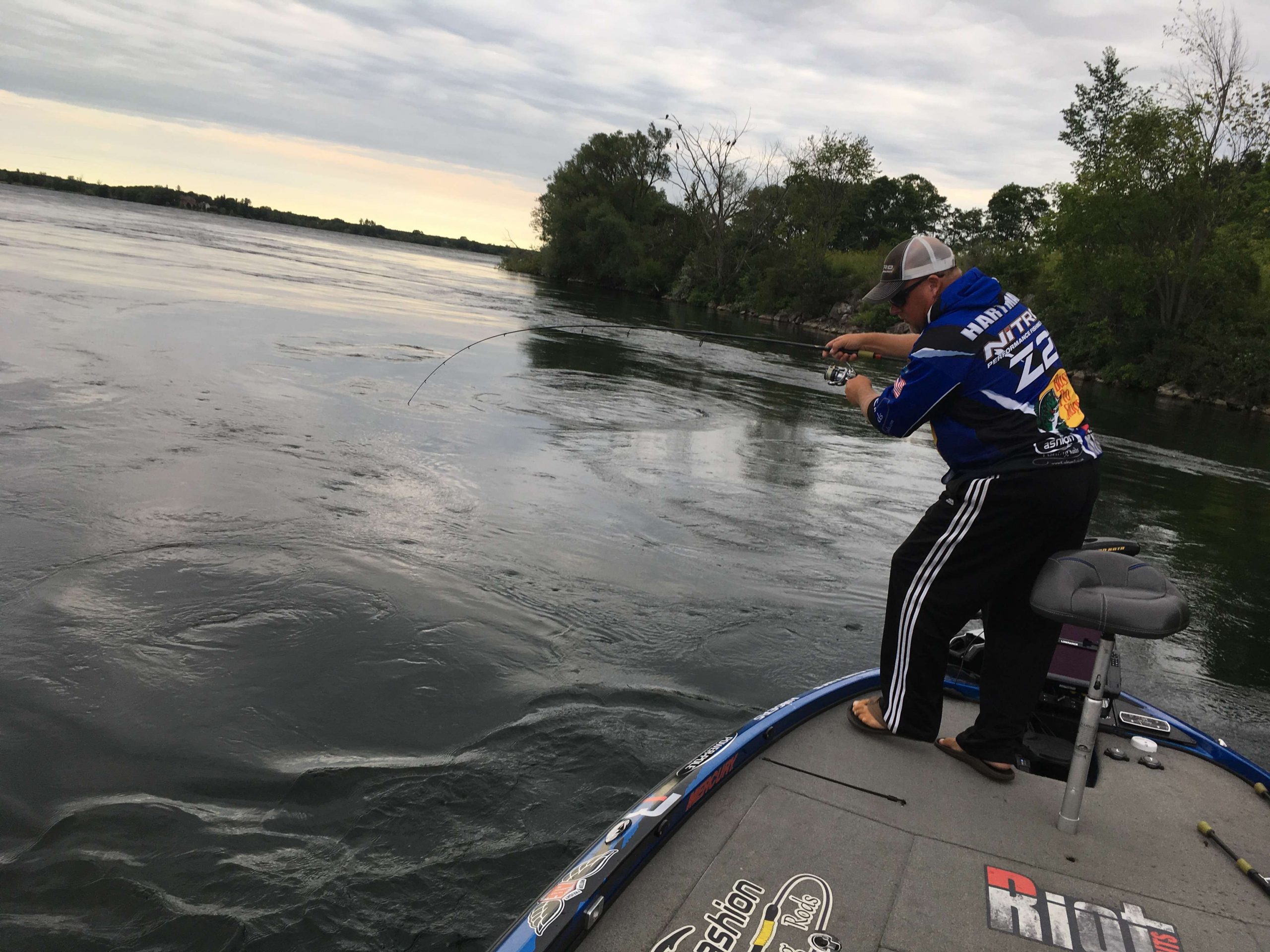 Jamie Hartman hooking up in back to back casts. The current takes him flying as he maneuvers to get the fish to the boat & so far, he's got them all safely in the livewell. 
