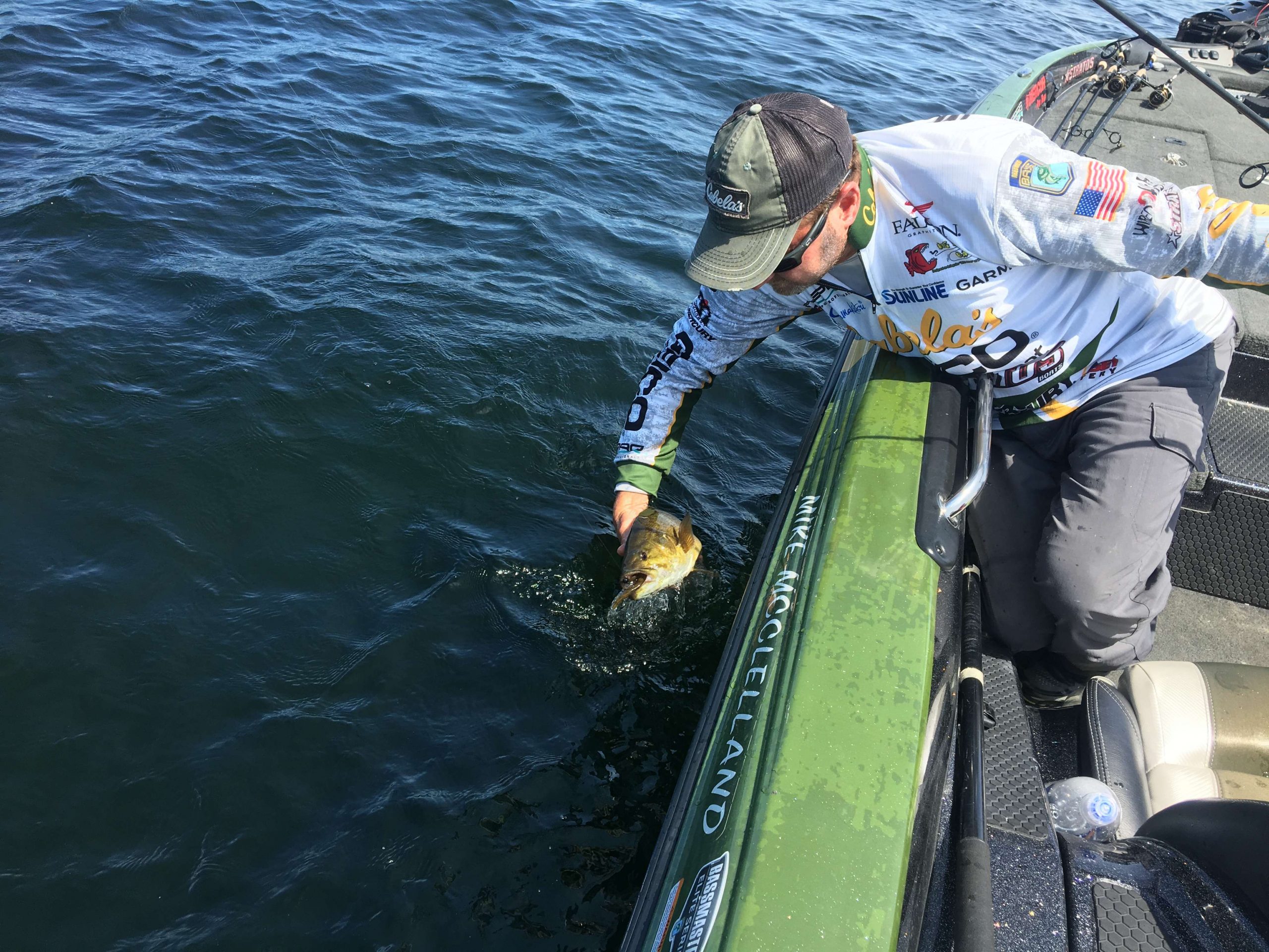 Mike McClelland keeps chipping away with another keeper smallie.