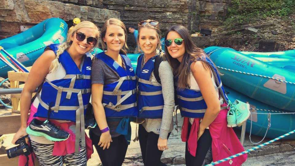 And away they went. Arika VanDam, BreeAnna Lucas, Kristen Agnew and Hartman suit up for the rafting experience.
