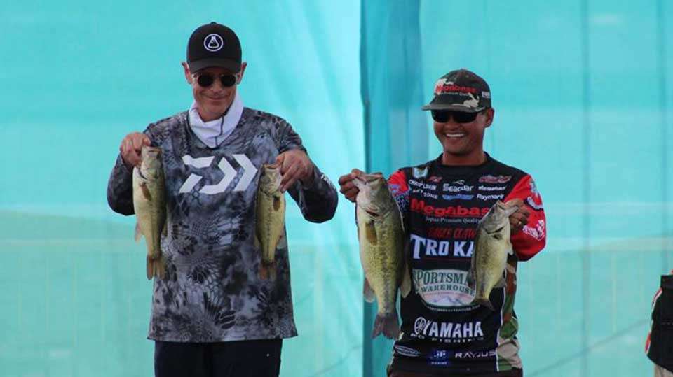 Chris Zaldain and his teammate, James Reilly, show off their Delaware River bass.