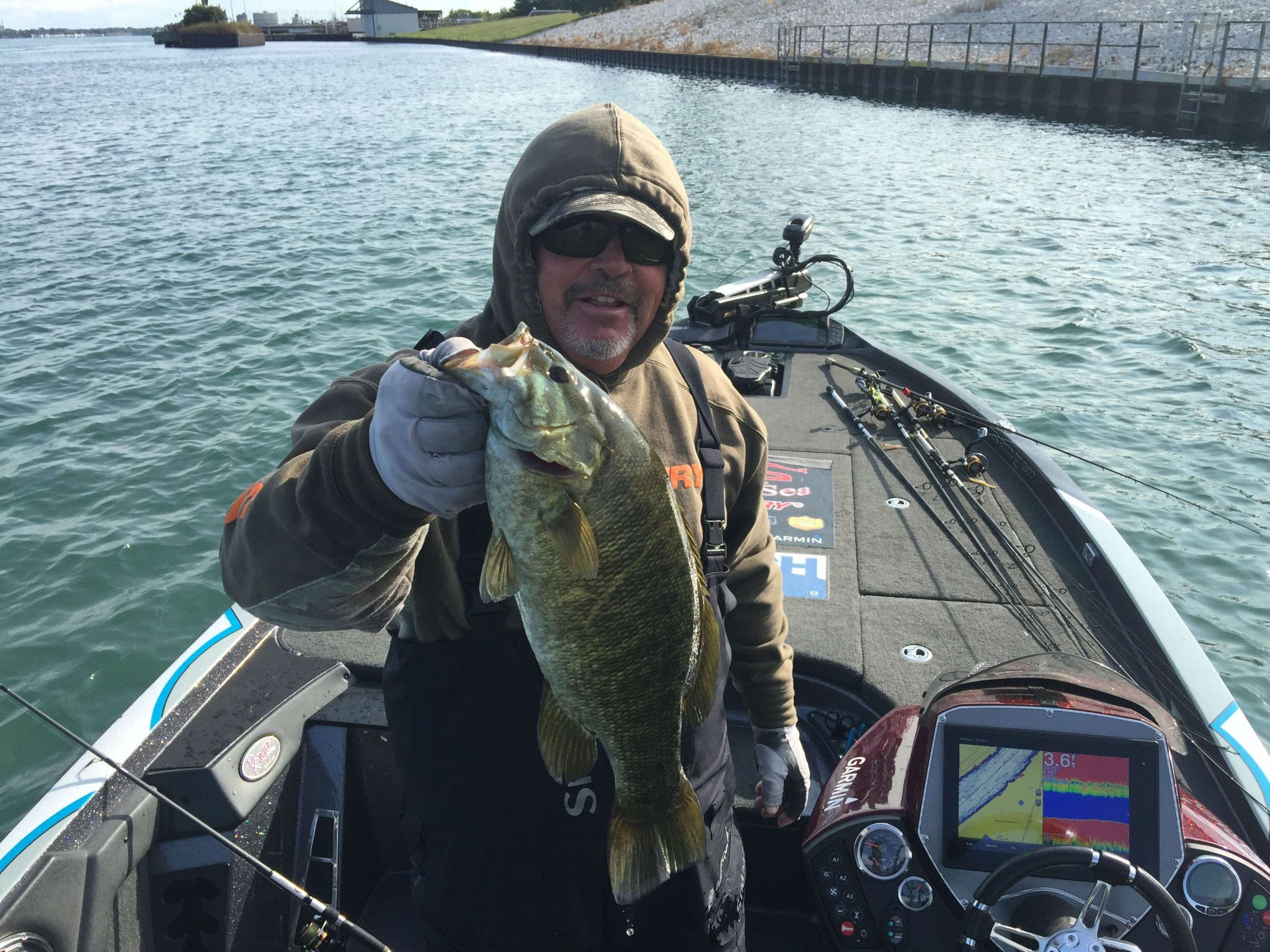 John Murray on the board with a healthy smallmouth.
