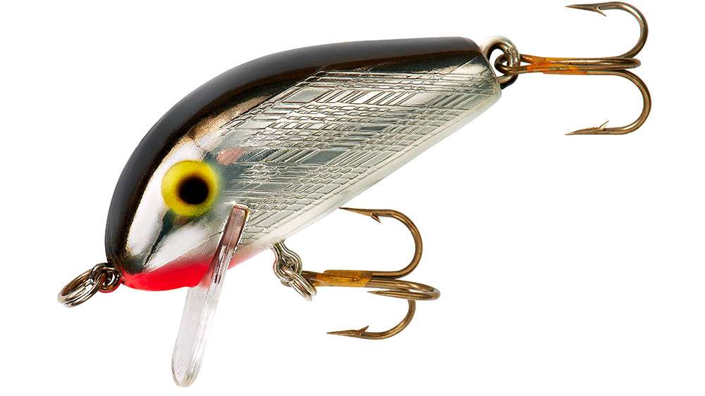 <p>Rebel Humpback</p>  <p>The 1/4-ounce Rebel Humpback is a classic, shallow-running crankbait that will dive to one foot and is perfect to fish near weeds, grass, rocks, stumps and jetties. With a tight-wiggling action, the lure will entice bites every time it is in the water. The classic shape of the 1 3/4-inch long Humpback allows it to be fished across the top or just below the surface. MSRP: $5.99 