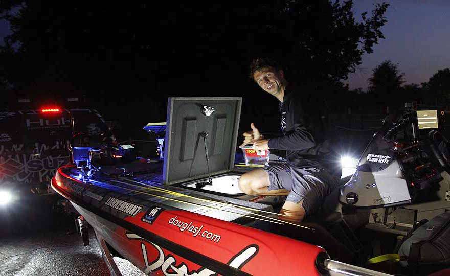 Chad Pipkens gets geared up for Day 2. He hopes to follow up with a big catch to make it a repeat for Championship Saturday. Last month he made the Top 12 cut at Oneida Lake. 
