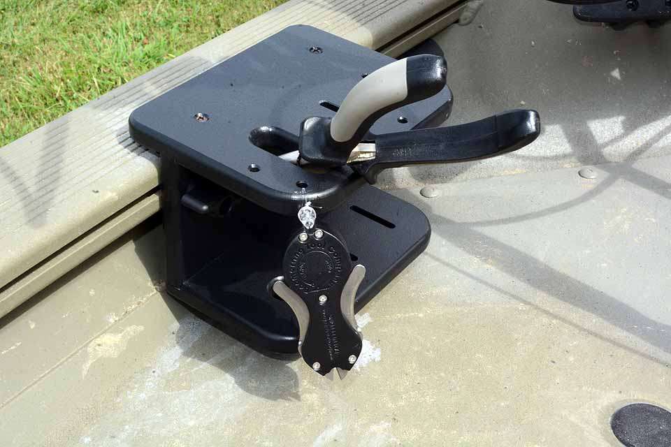 VERSATRACK from Tracker Boats is a standard accessory rail with optional attachments. DeFoe added this tool holder at the bow for convenience. 