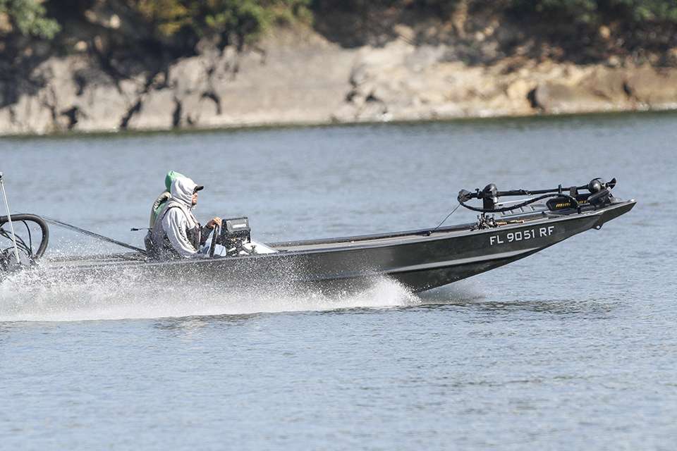 Drew Benton races by in an aluminum boat.