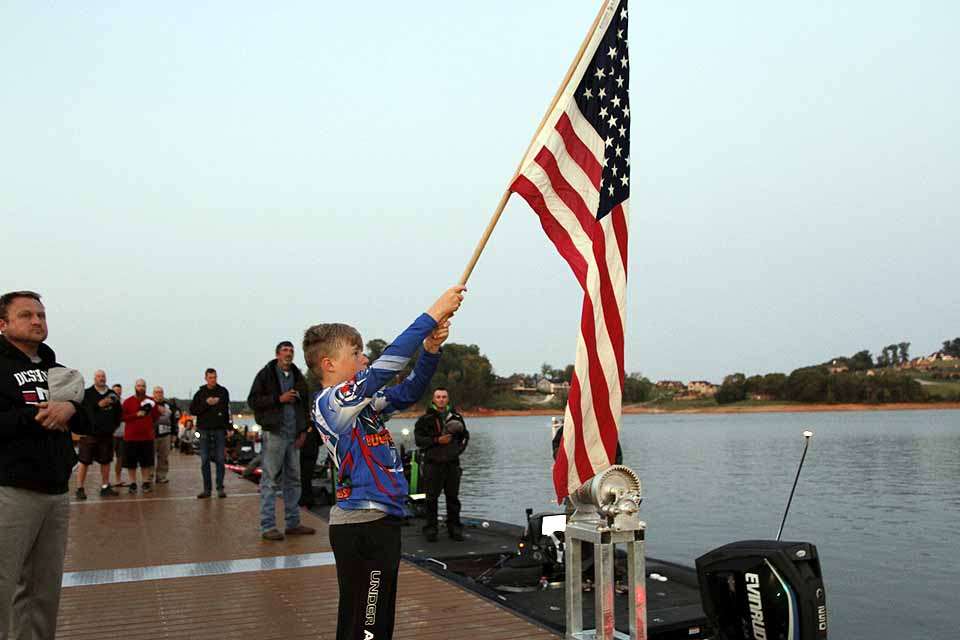 The flag is held high at Dandridge Dock just prior to takeoff for the final event of the Bass Pro Shops Bassmaster Northern Open season of 2017. 