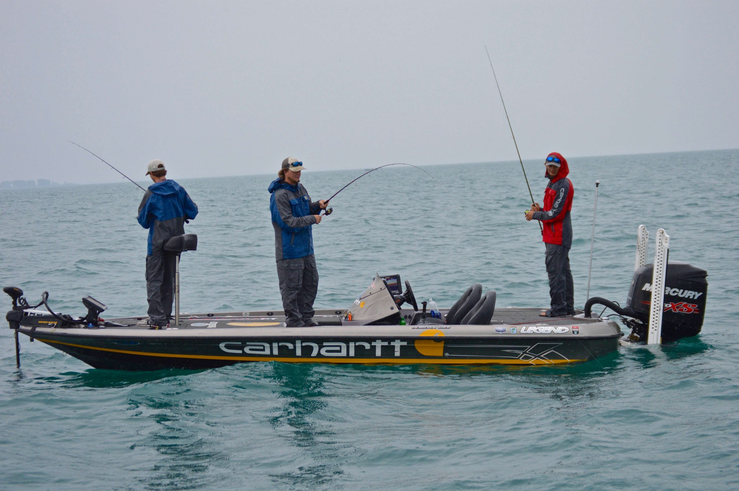 After the move a light rain started. The anglers threw on their Carhartt rain suits and stayed focus. Smith kept the hot hand and hooked up again.
