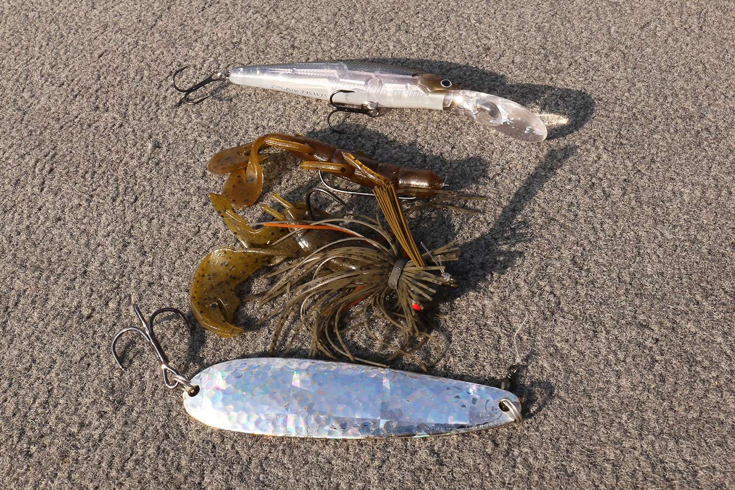A 3.5-inch Lucky Craft Staysees 90 ver.2 jerkbait was a top choice. Morris also chose a Zoom Ultra Vibe Speed Craw for Carolina and Texas rigs. He also relied on his mainstay 3/4-ounce War Eagle Football Jig with a Strike King Rage Craw. For suspended fish he used a 4.75-inch Flutter Spoon. 