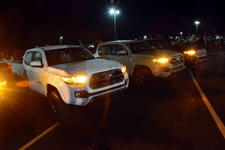 Toyota Tacoma and Tundra pickups begin hooking up to launch all 61 of the boats.