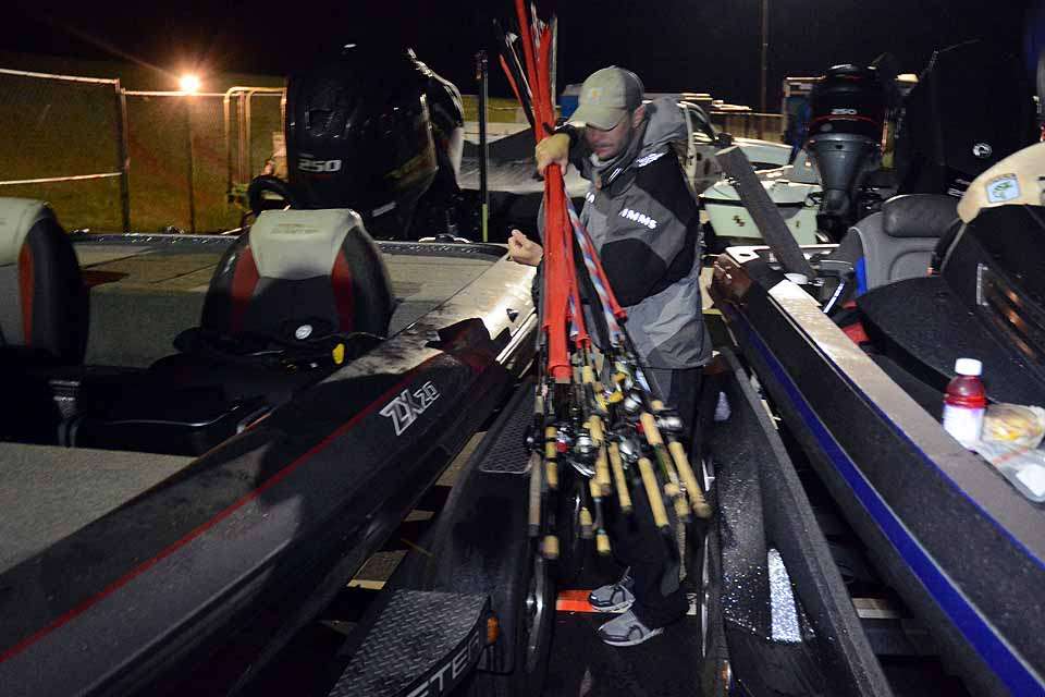 Co-anglers load their gear into the boats as the day is nearly underway. 