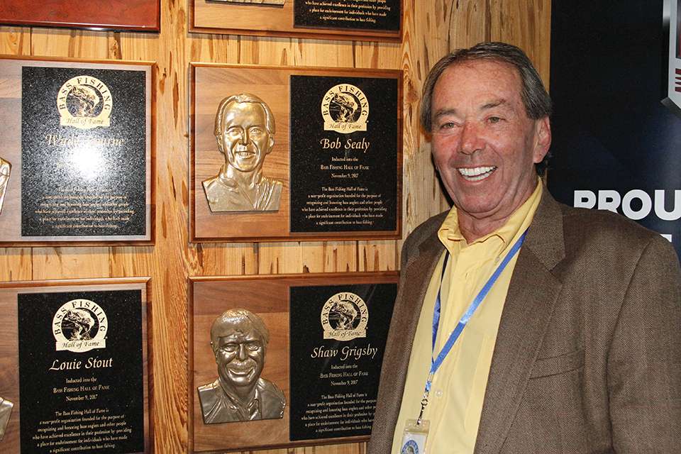 Bob Sealy was one of the inductees this evening and he poses by his plaque on the wall.