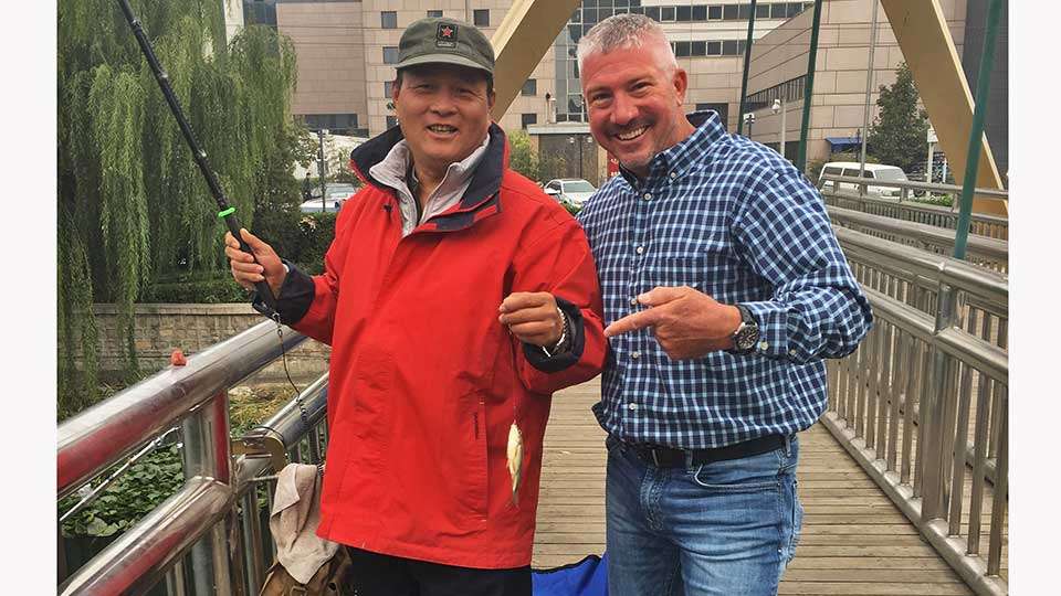 Just out touring the grounds near the hotel in Beijing, Randy ran across his first Chinese fisherman. âHe caught this one two minutes after I met him right in the middle of downtown,â Randy said. âThere were a lot of people fishing there, and this guy was the only one I saw catching them!â 