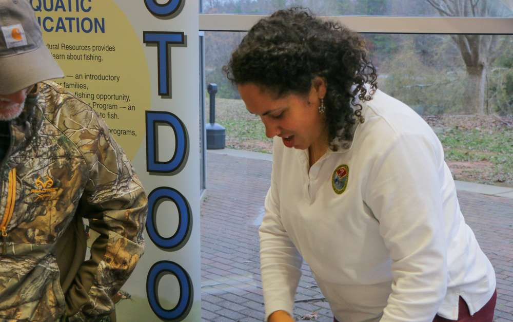 South Carolina DNR representative Sarah Chabane, was on site handing out material to educate young anglers as they registered before Friday nightâs dinner.
