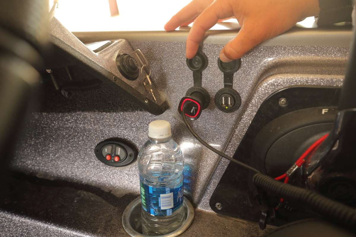 The boat is equipped with many conveniences including multiple charging ports and a cup/bottle holder. Jack plate and trim controls as well as Power-Pole buttons are close at hand also.