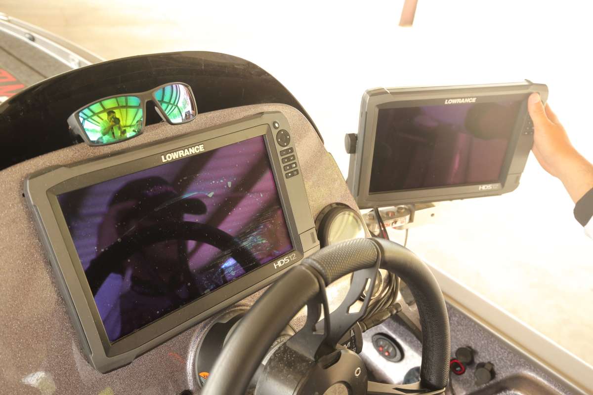 The boat's other two Lowrance HDS-12s are found on the console. One is flush mounted, and the other is attached with a T-H Marine Kong mount. The unit above the steering wheel will show StructureScan. The second screen will be a three-screen split of chart, sonar and DownScan.