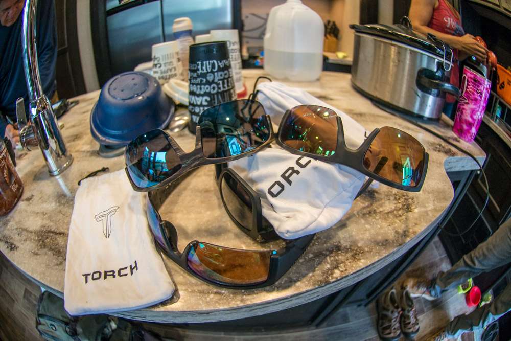 More must-have gear is nearby. Brandon wears Torch Sunglasses. The built-for-fisherman brand is an upstart company with a growing following among pros. 
