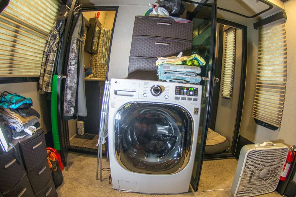 Sharing space in the man cave is a full-sized all-in-one washer/dryer combo. Tiffanie says it gets nearly daily use. âWhat I like most is not having to keep up with unloading wet clothes from a washer and into the dryer.â 
