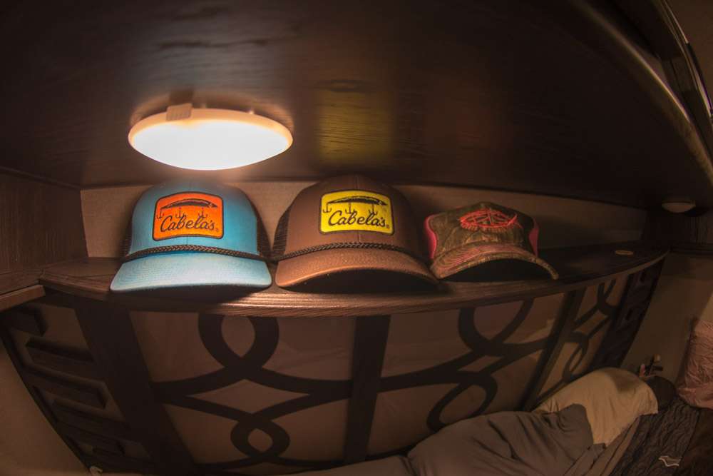 His and her hats are also nearby. Those are above the bed in a handy dandy storage area made just for hats. 
