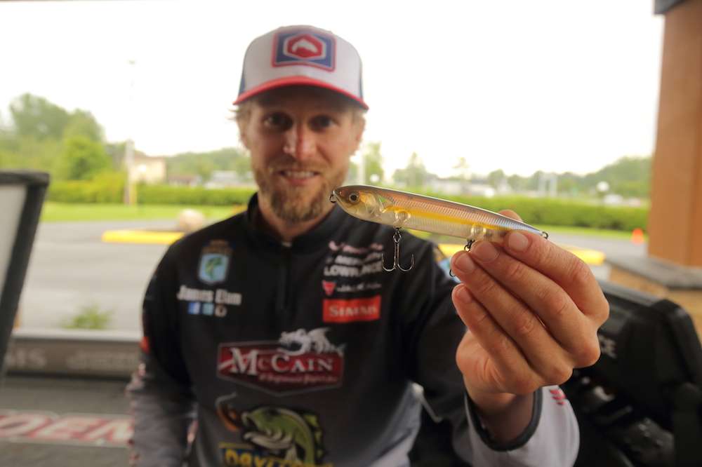 Elam shows off a Jackall Bowstick from the box, a big walking bait.