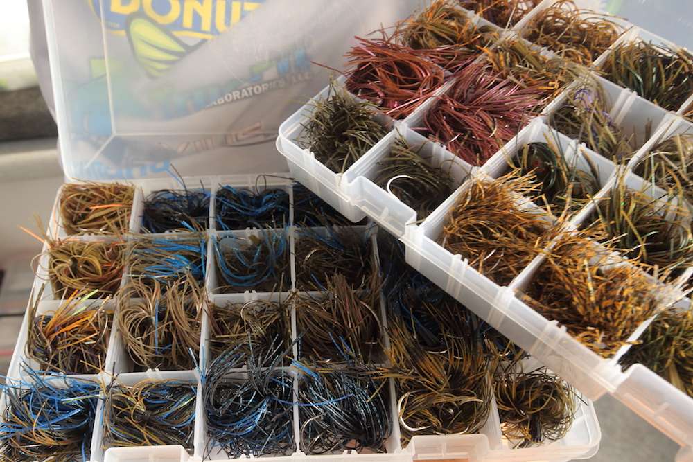 Elam has two boxes of colorful jigs to show off. 