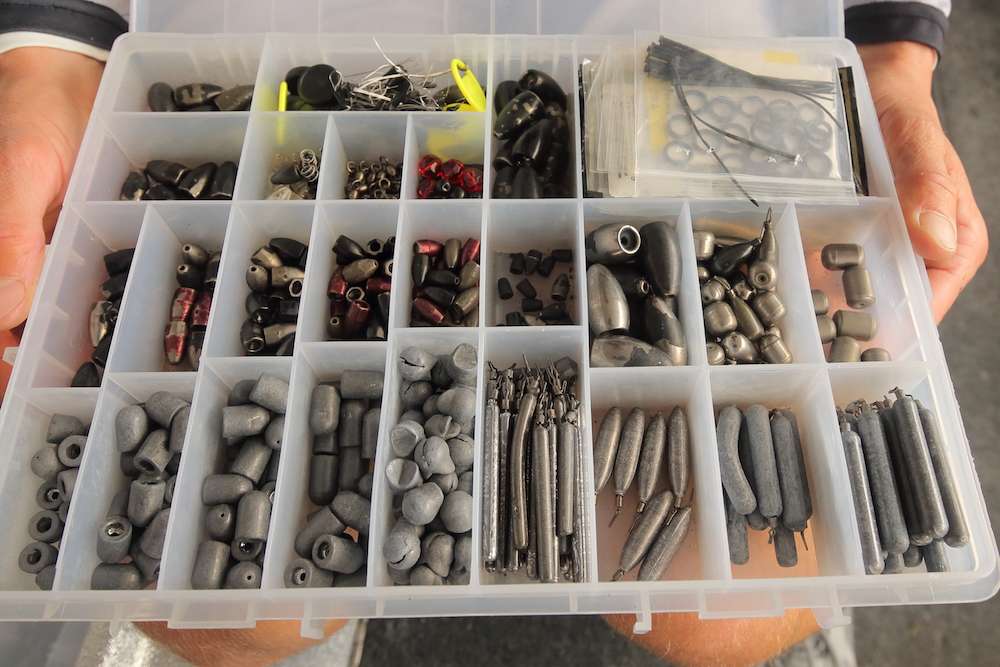 This box organizes a large selection of weights. 