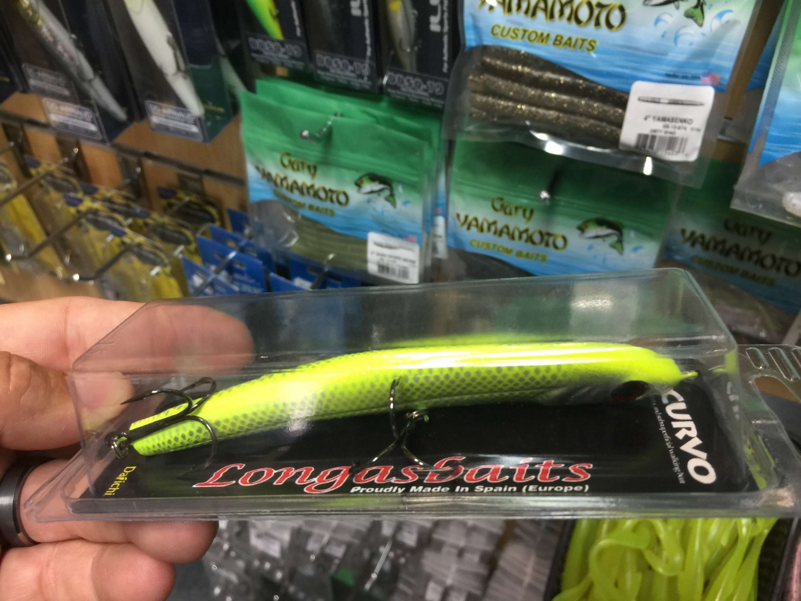 This is the Curvo topwater bait by Longas Baits, one of the most popular brands in Spain. It actually dives under the water a couple of inches before popping back to the surface. Lake Caspe is known for its topwater fishing, and this is one of the local favorites.