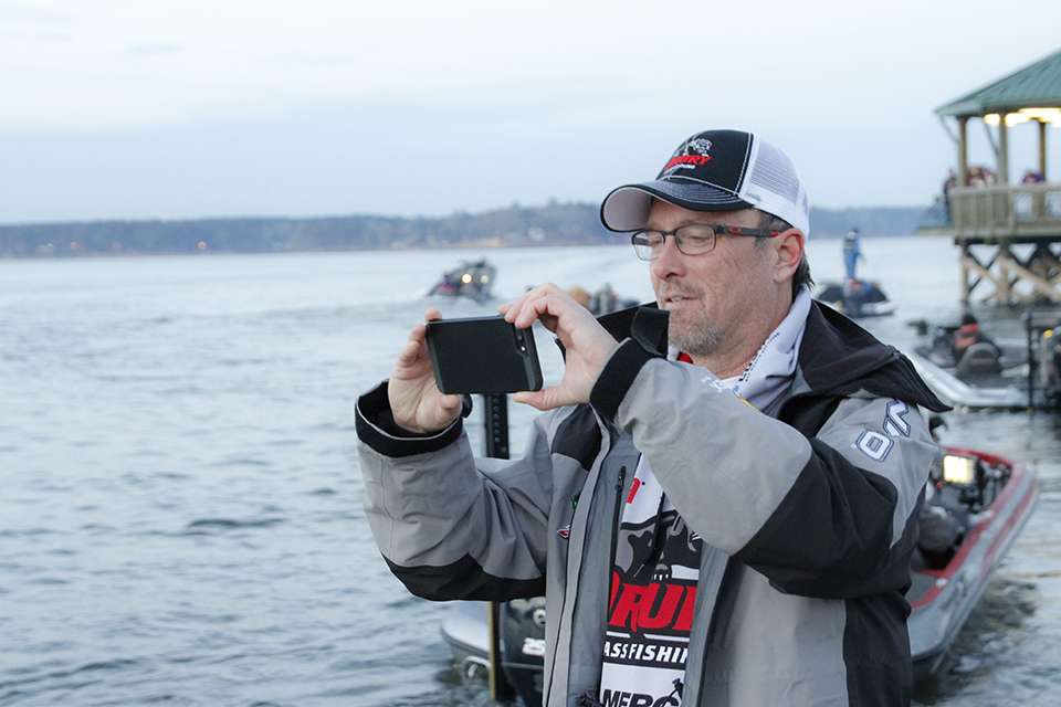 Rick Emmitt takes photos of his Drury State anglers.