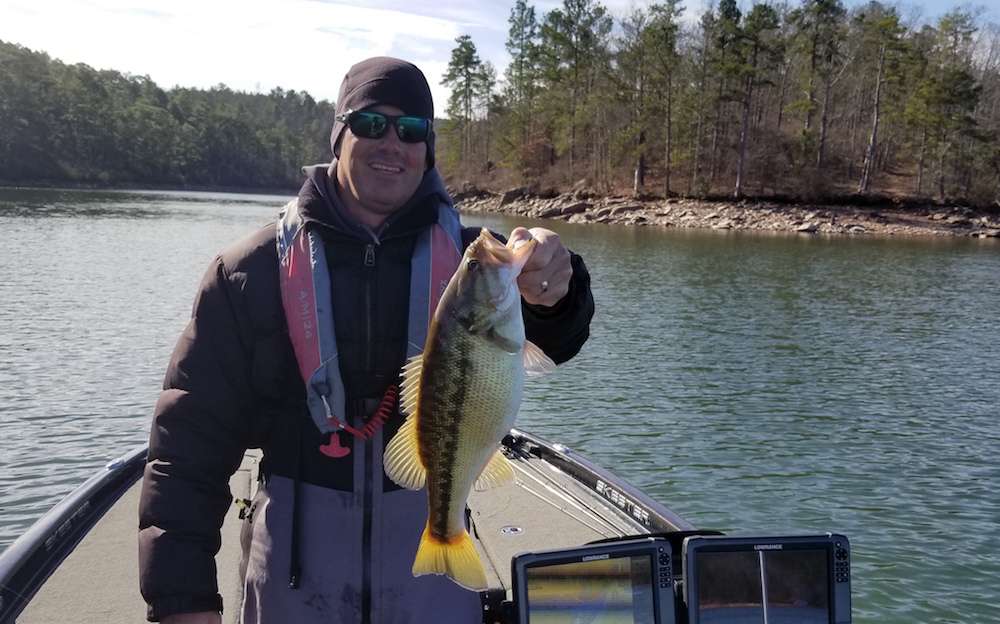 Tyler Carriere is hoping build on top of his first fish of the morning, a solid 2 3/4-pound spot. It appears at this point that he is committed to finesse fishing and trying to find the even better spots that he had found during practice. 
