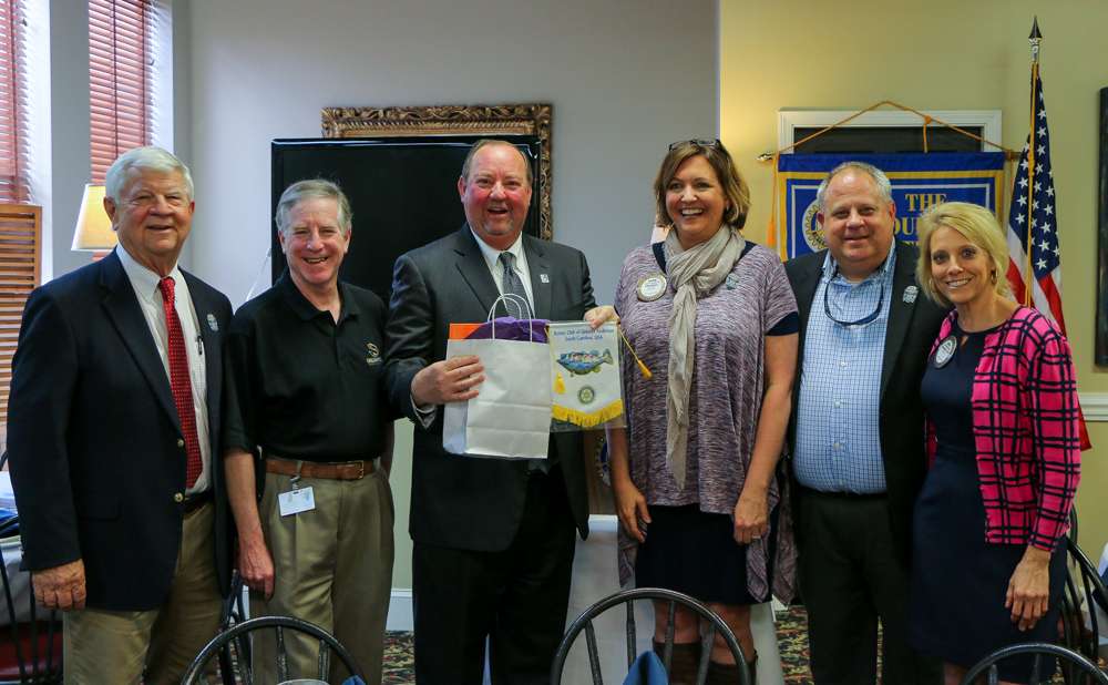Dave Precht, Glenn Brill, Bruce Akin, Jeanie Campbell, President of the Greater Anderson Rotary Club, Neil Paul, and Tricia McDougald, of the Greater Anderson Rotary Club, pose for a photo to wrap up the dayâs festivities. 