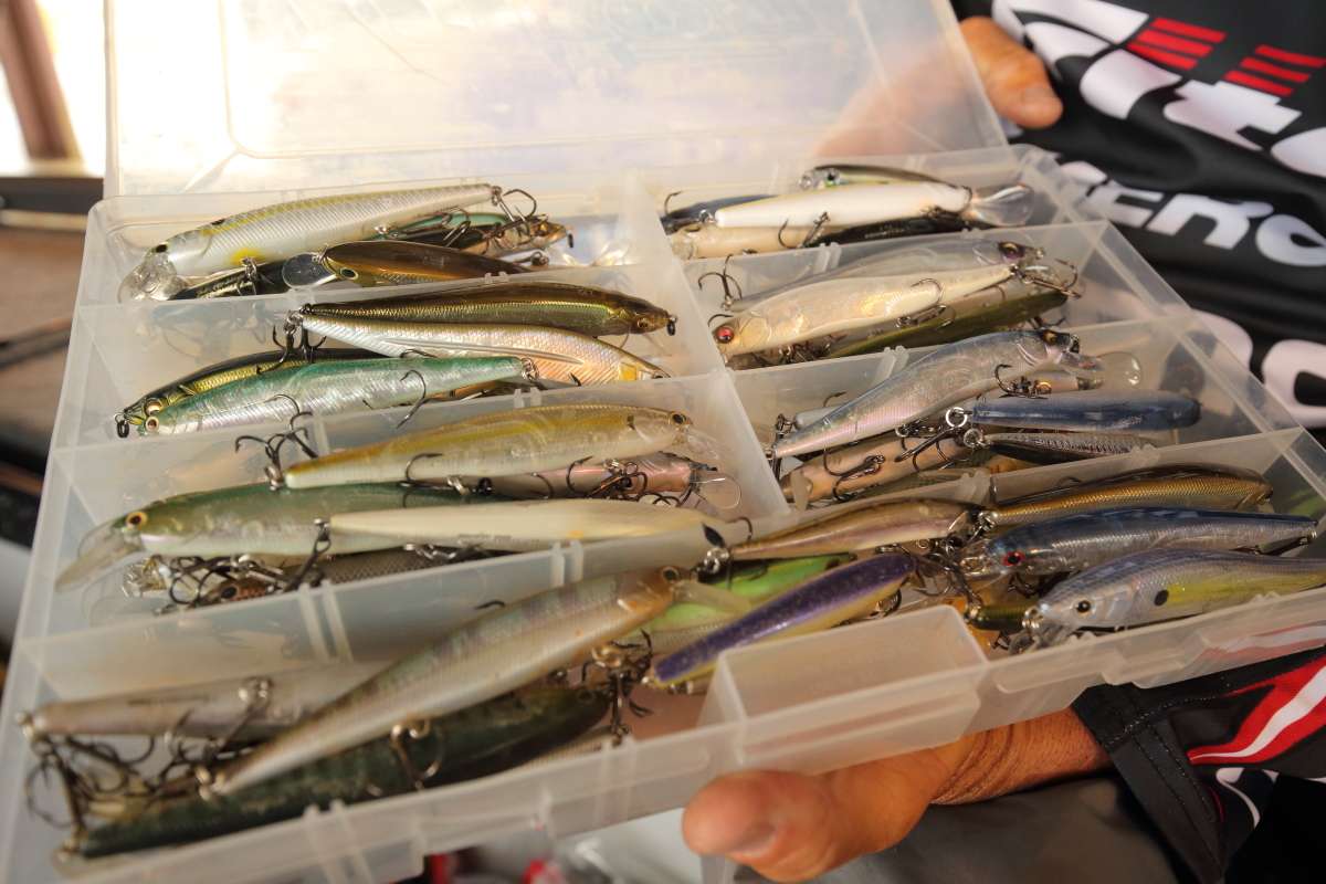 A box of assorted jerkbaits includes Lucky Craft Slender Pointer 112s, the Megabass Vision 110, a little bit of everything.