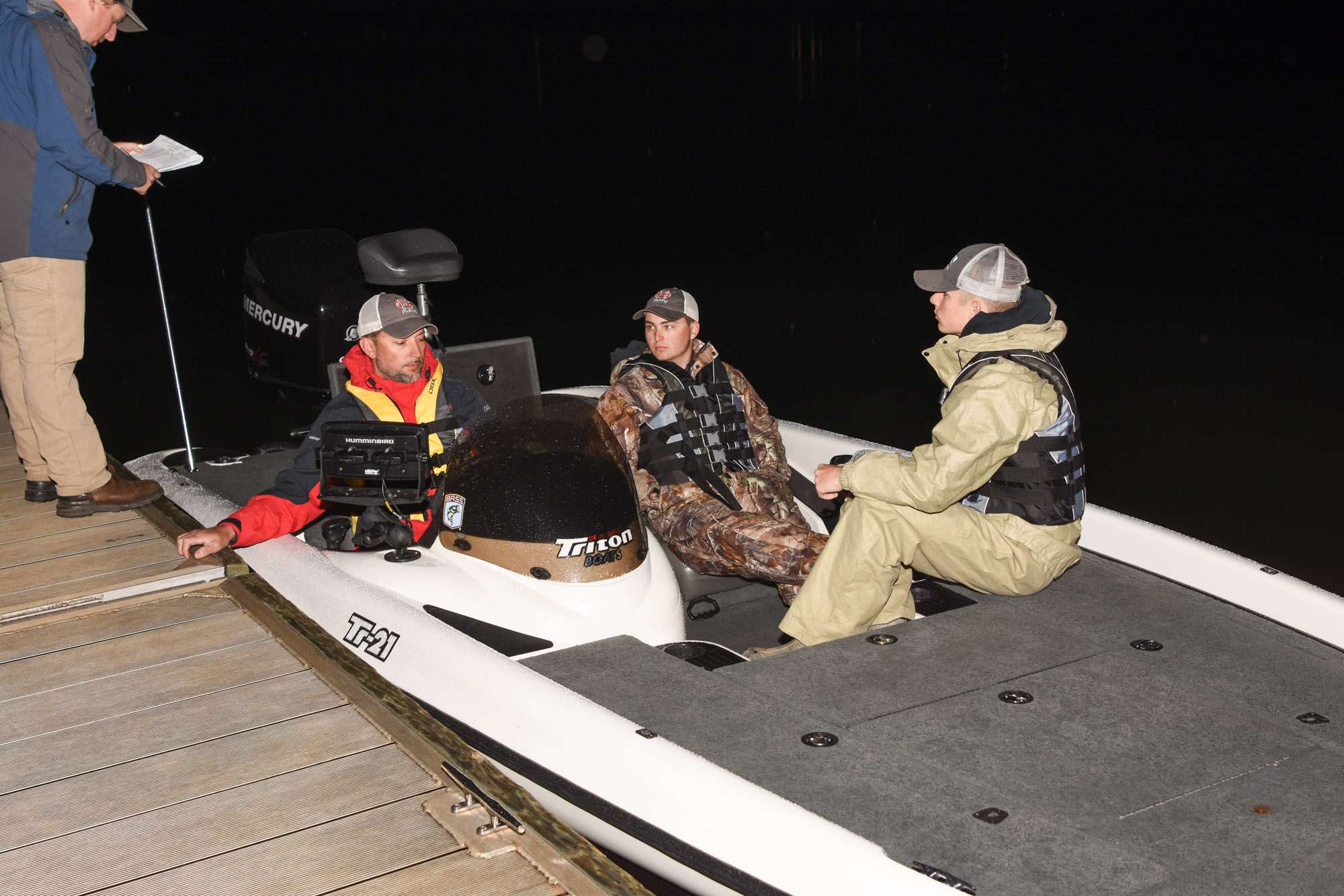 Hank checks the boat for Good Hope High School anglers  Chase Taylor and Colton Williams
