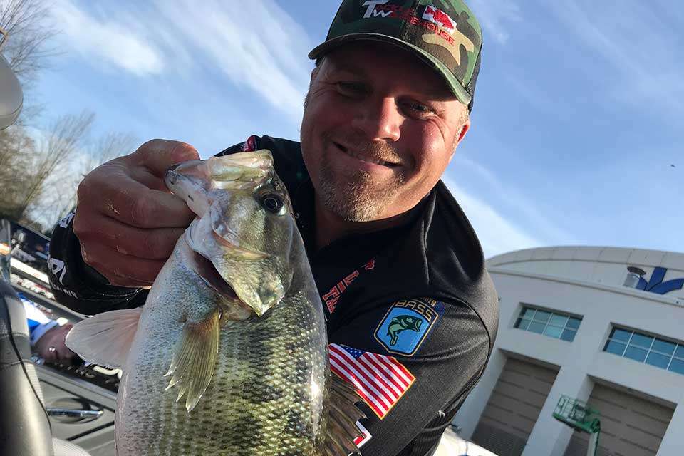 Back outside, Luke Clausen, who won the 2006 Classic, shows off one of his Lake Hartwell spotted bass as he bags them for weigh-in. Picked by many in his Fantasy Fishing grouping, Clausen could only muster a 32th-place finish.