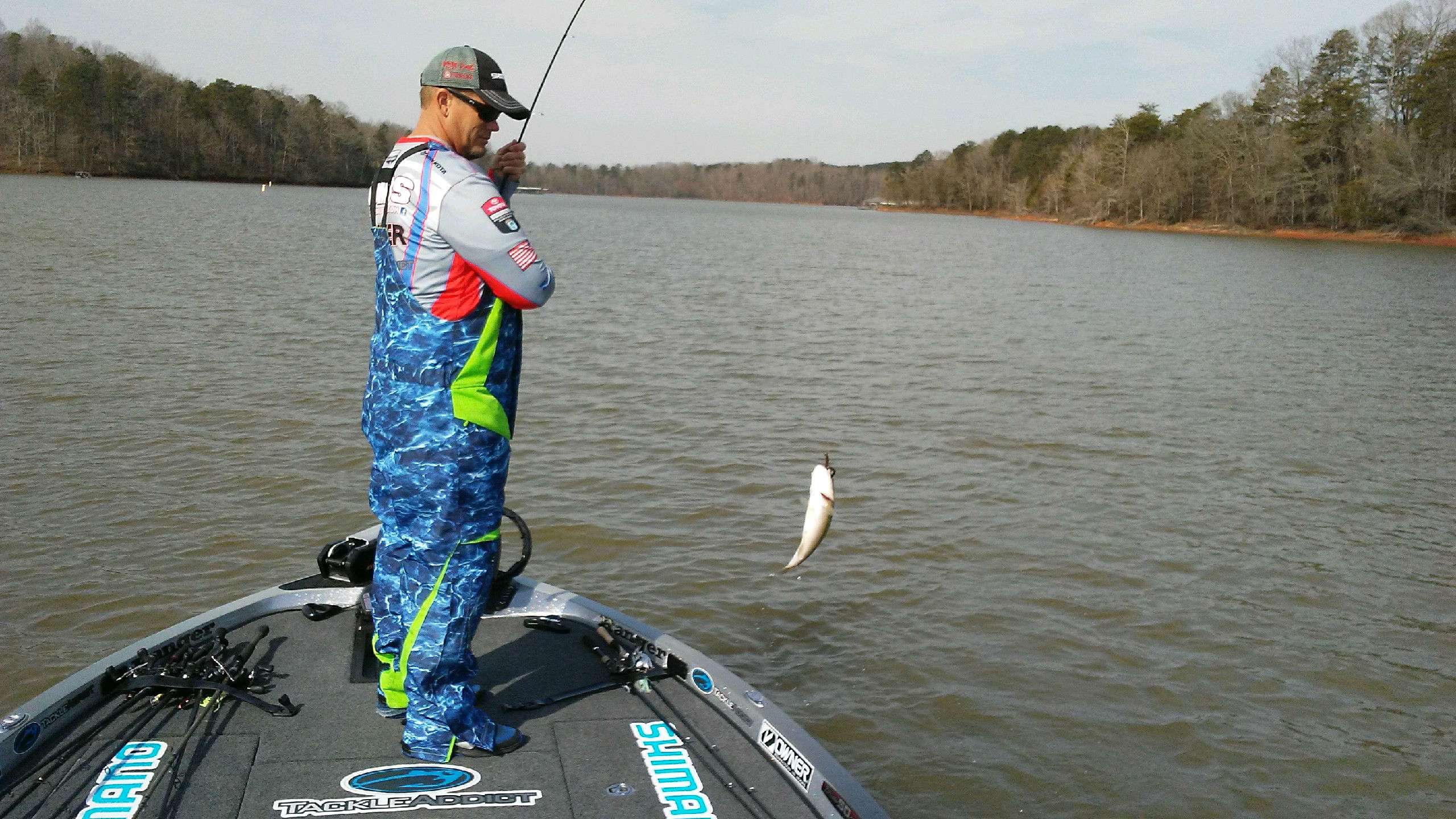 Keith Combs has a small limit. He swings a spot into the boat but it won't help. 