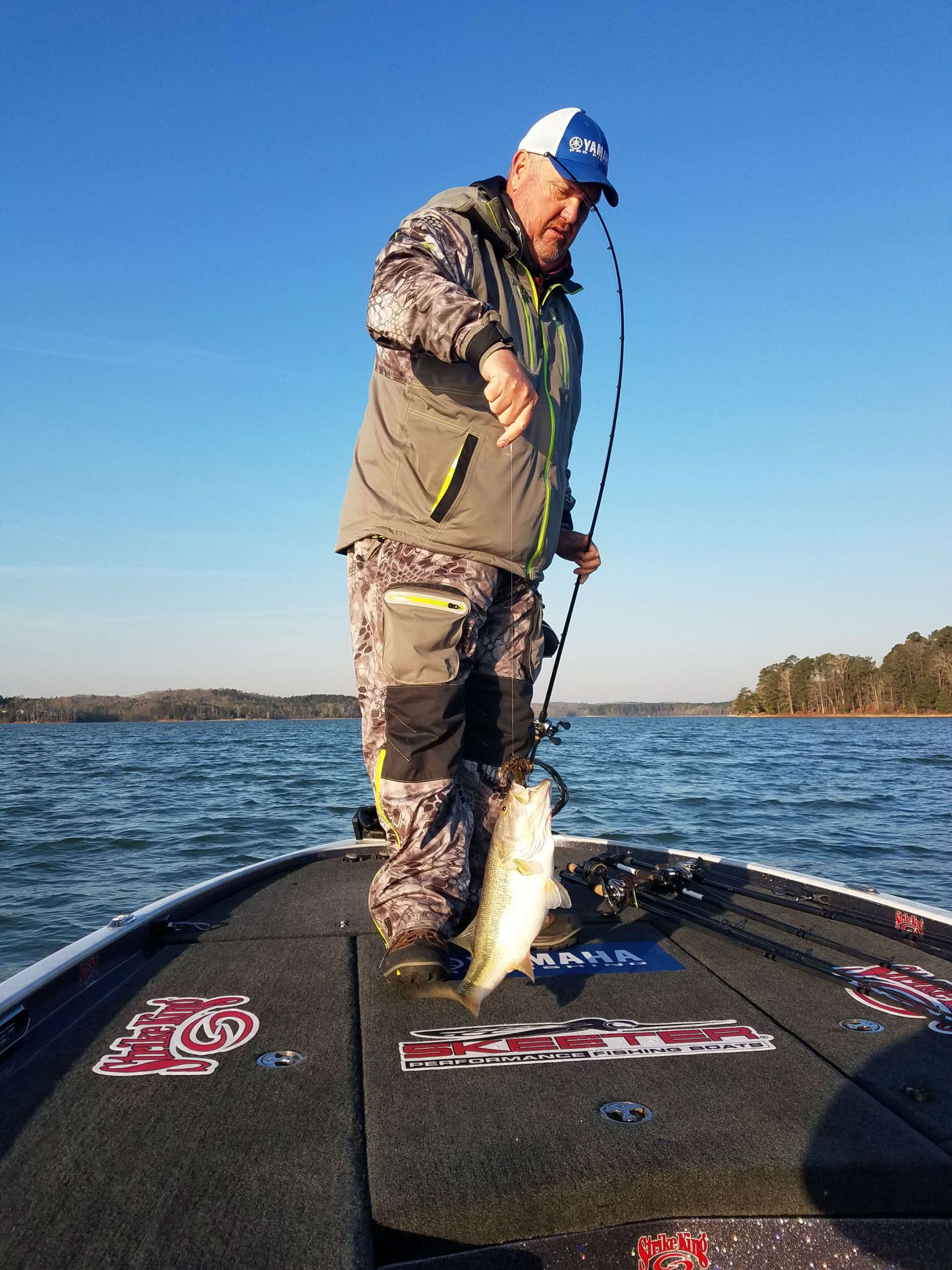 Mark Davis has caught his 4th keeper. It was a better fish, the kind he needs to build on for a good limit. He's fishing deep, slow, and methodical. 