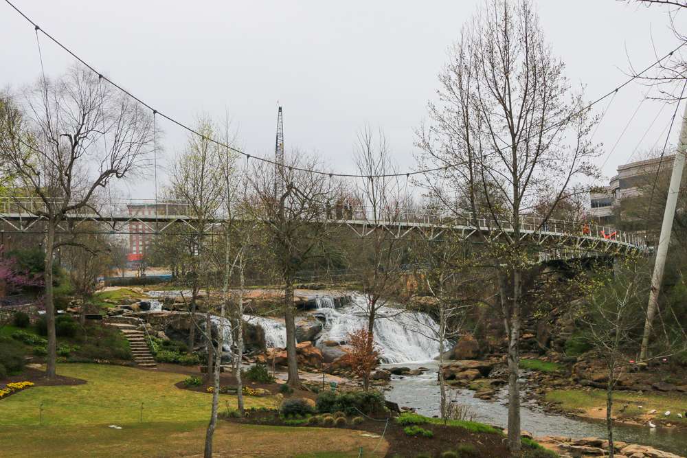 Views of the Liberty Bridge from the entrance of the Swamp Rabbit Trail, a landscaped garden with scenic views of downtown Greenville. 