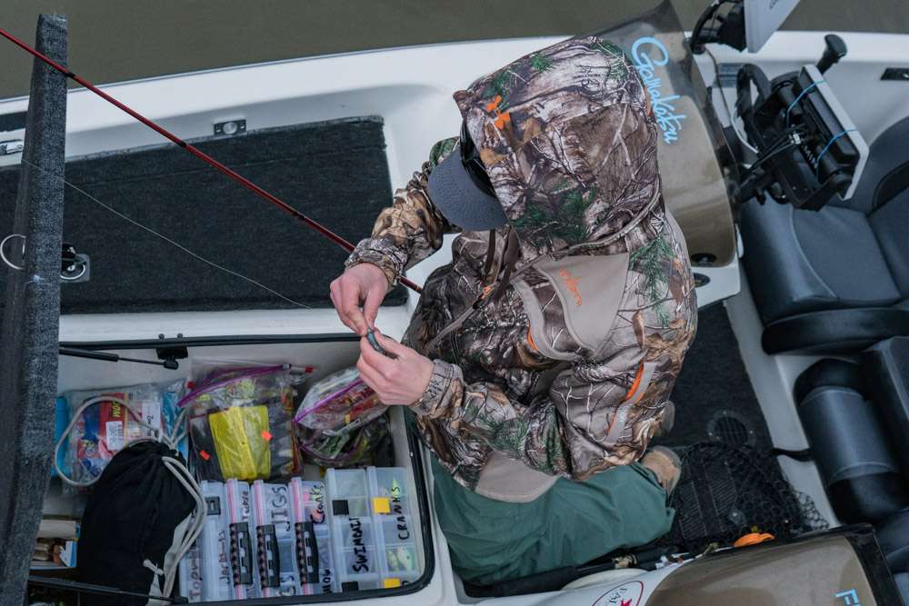 Justin Roberts from Marion High School in Marion, Illinois ties on his confidence bait. 