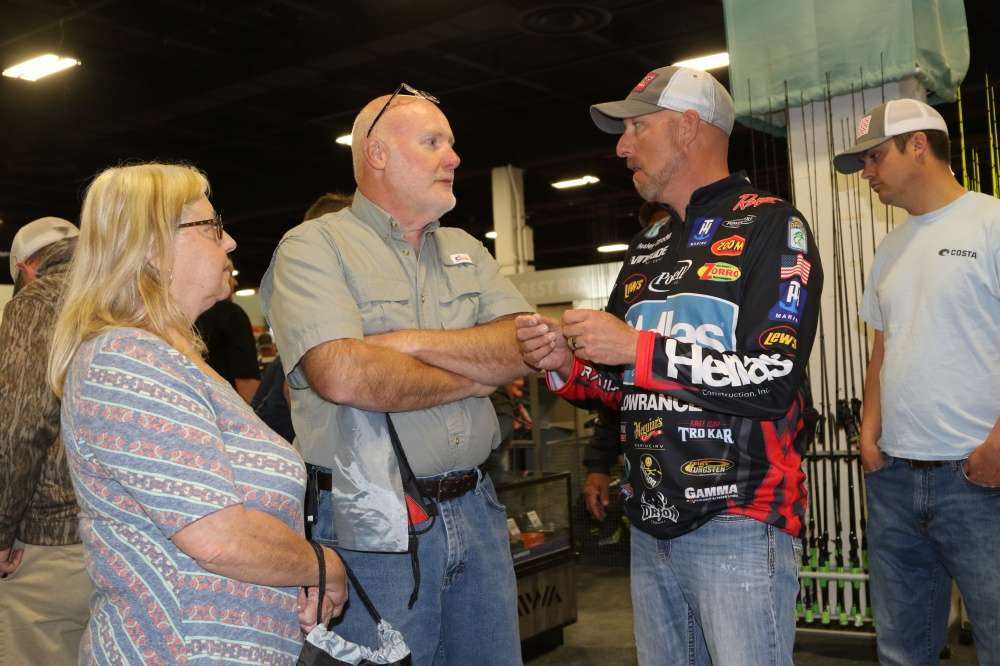  Elite pro Wesley Strader chats with folks in the Academy Sports & Outdoors booth.