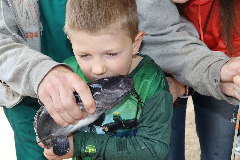 Wyatt Borksky gave his catfish a big kiss before release.