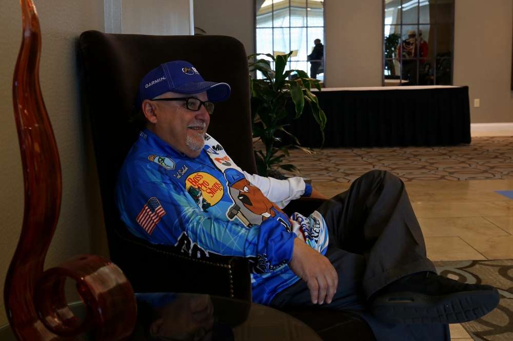 Carl Svebek III is one of the first anglers to arrive at registration for the GEICO Bassmaster Classic presented by DICKâS Sporting Goods. He finds one of the many seats in the lobby that will soon be full of anglers. 