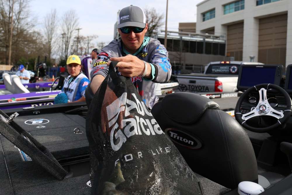 Dustin Connell bags his fish...