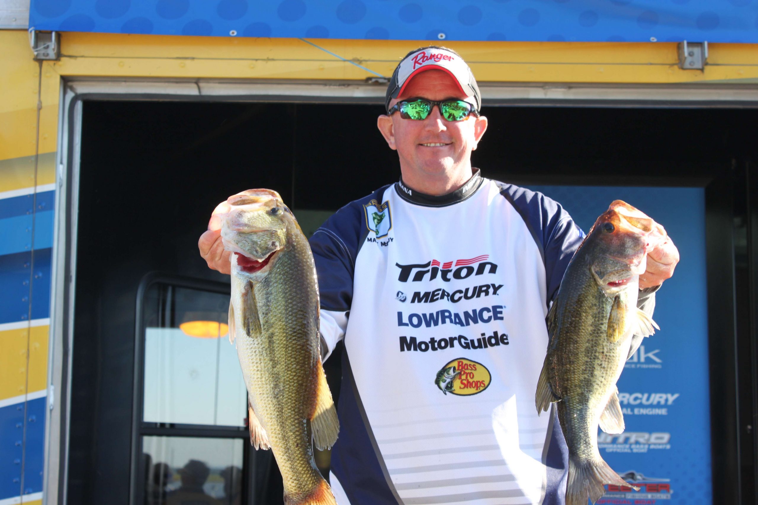 Look what I caught, ma! Matt McCoy is all smiles as he displays some of his five-bass limit that weighed 16-9 and put him in 14th place among boaters.
