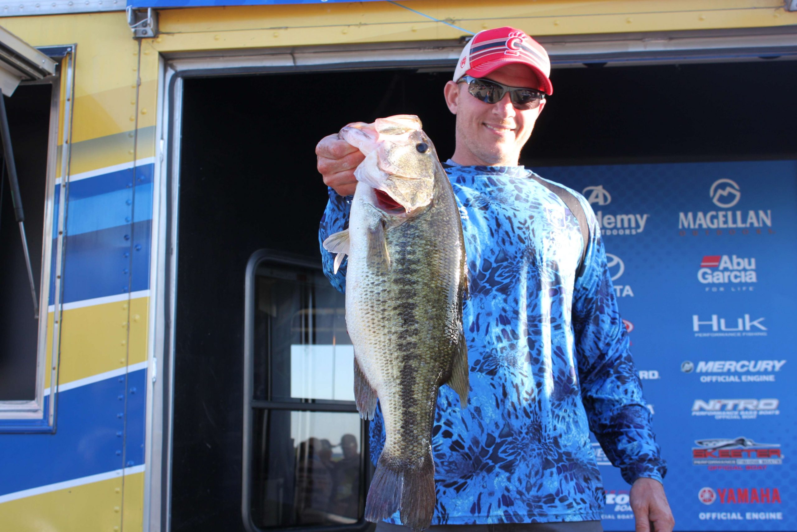 John Roth of Team Indiana is third among boaters with 20 pounds even. Here, he holds a 6-plus pounder that vaulted him near the top of the leaderboard.