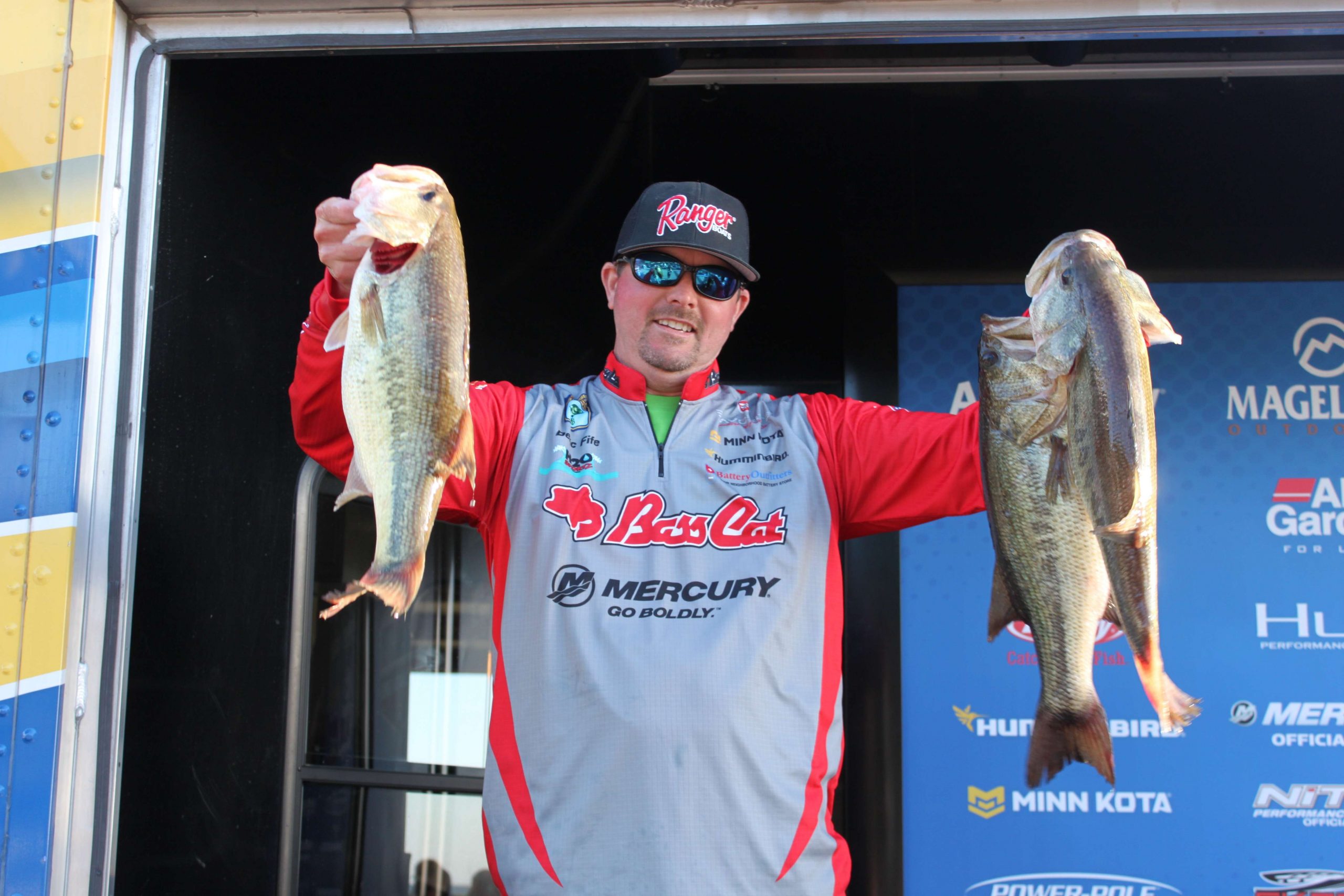 Deric Fife needs an extra hand, folks. Here, the Team Arkansas boater displays three beautiful bass that were part of a limit that has him in fourth place with 19-14.