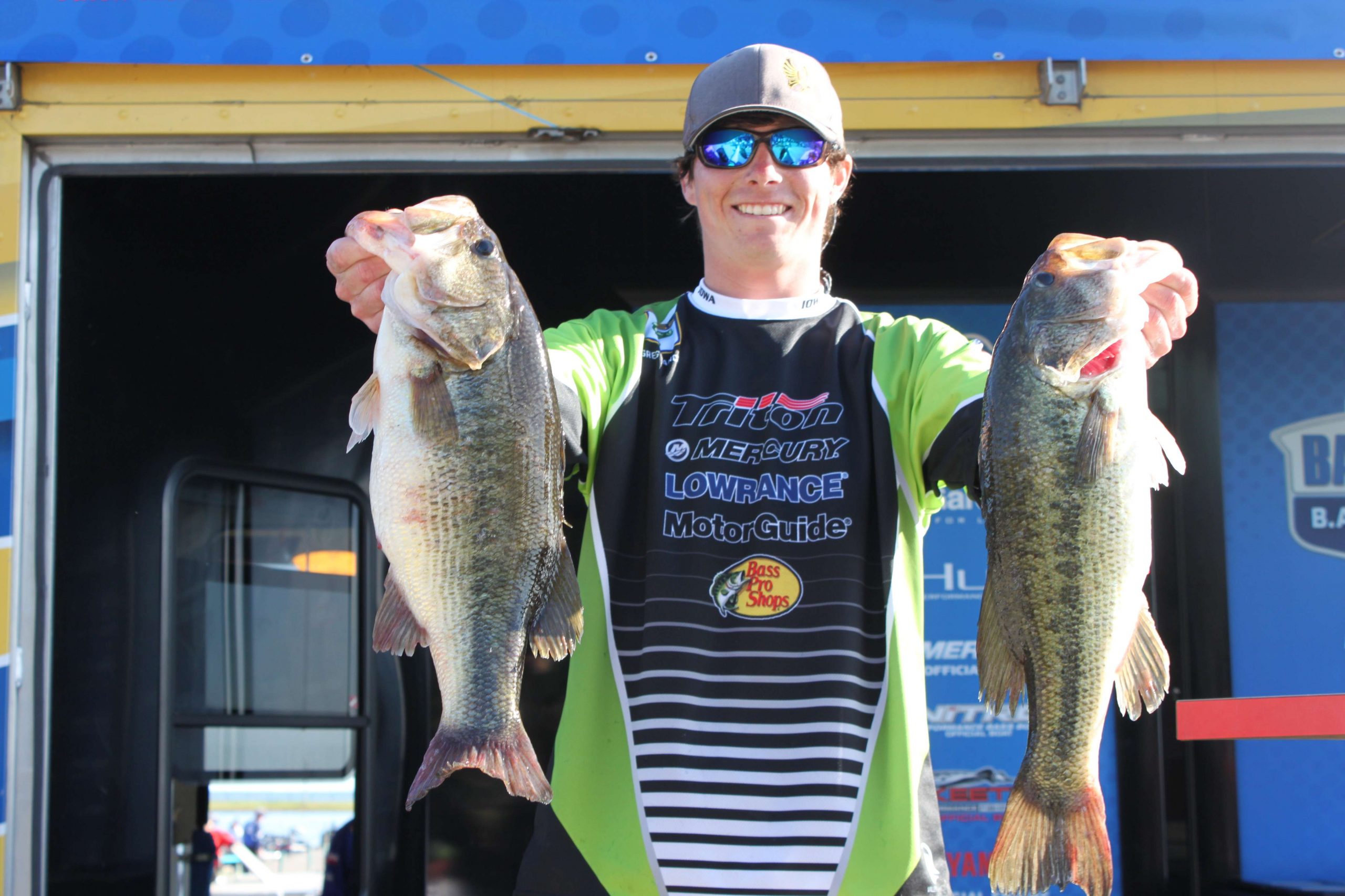 And that's this guy -- Greg Vance of Team Iowa. The young angler has put together a two-day total of 38-10. Here he shows two of the toads that were part of his 21-2 limit on Thursday.
