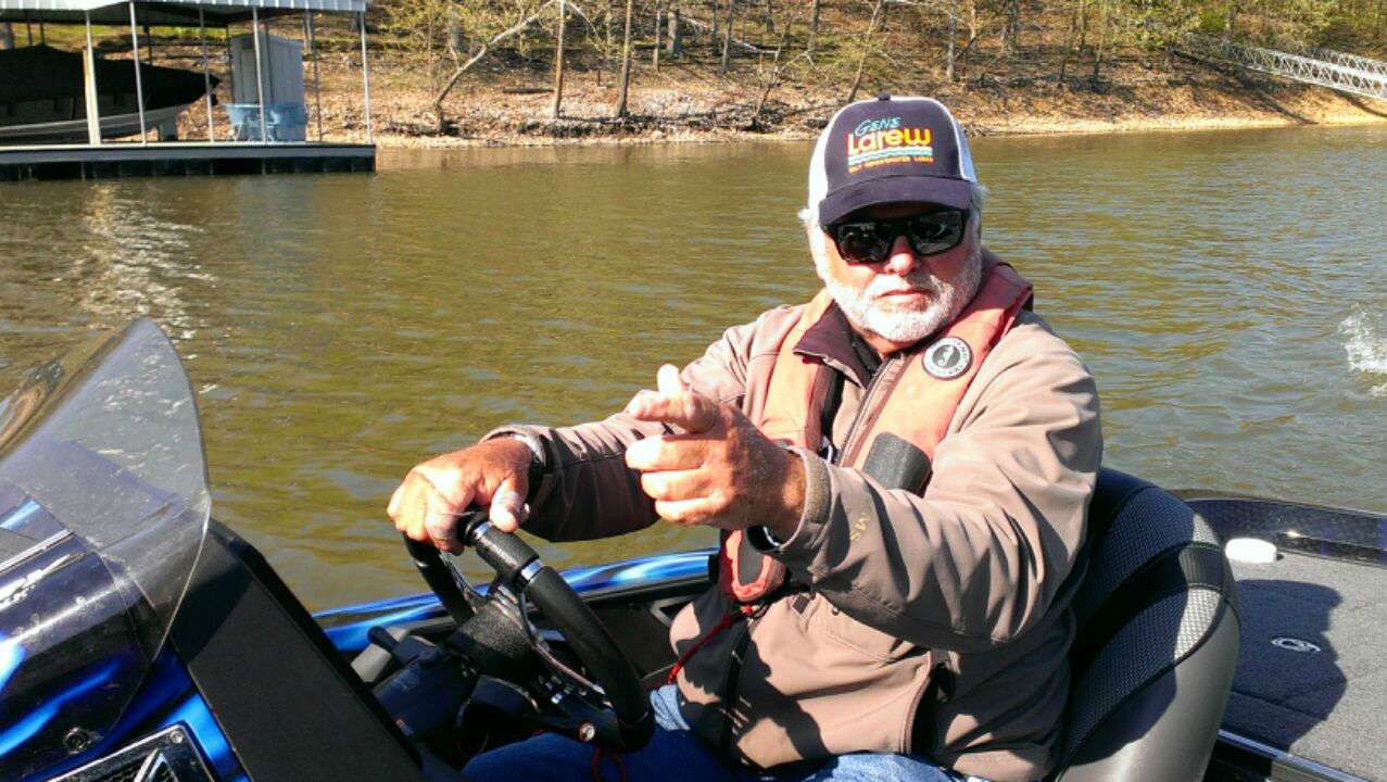 Tommy Biffle wonders where those 5 & 6-pounders are hanging out as he idles to another spot.
