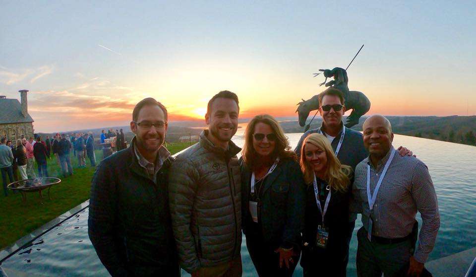 KVD (back right) and wife, Sherry (front center), enjoy the golf pairings party with some of their friends from Toyota at the scenic Top of the Rock clubhouse. B.A.S.S. CEO Bruce Akin and Chase Anderson, Executive Vice President/Director of B.A.S.S., attended the party along with numerous other Bass Pro Shops vendors and sponsors like Toyota, Carhartt and Mercury. Akin said, âTop of the Rock, thereâs just absolutely beautiful views from up there.â It is the highest point in Taney County, Mo. Left to right is, Phil Teeple (Saatchi & Saatchi), Tyler McBride (Toyota North America), Sherry VanDam, Jamie Schneider (Saatchi & Saatchi), KVD, Brent Marrero (Toyota North America). 