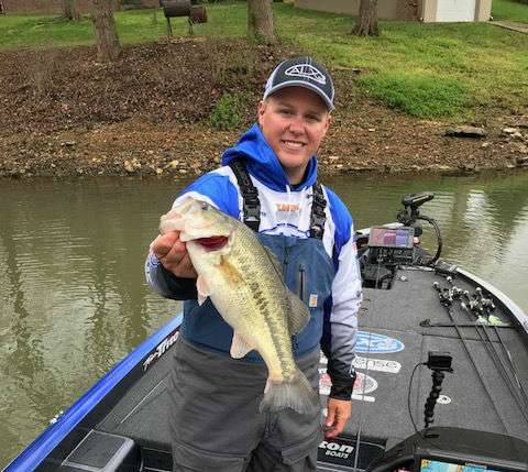 Another hour into the day and the 2014 College National Champion has made several moves.  The cold temps are making runs cold. A few more lost fish and one short one and Jake Whitaker is on the board!  
